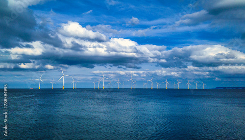 Offshore Wind Turbine in a Wind farm under construction off coast of England, UK