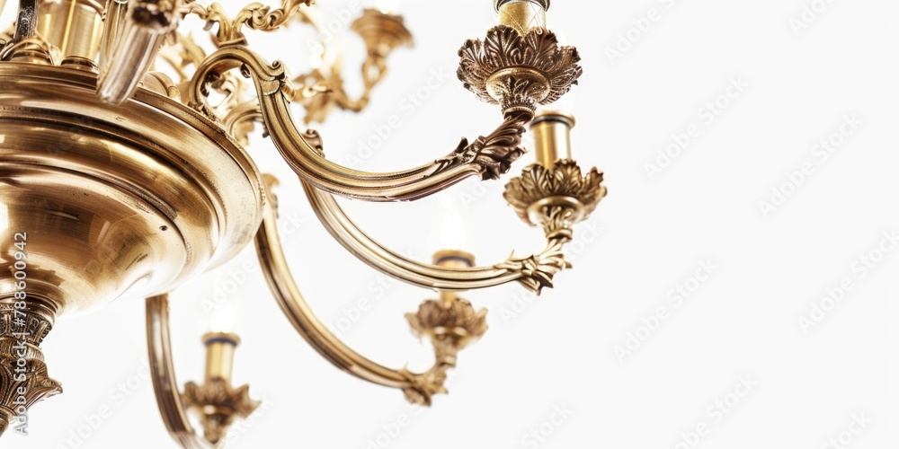 Elegant gold chandelier hanging from the ceiling, perfect for interior design projects Elegant gold chandelier hanging from the ceiling, perfect for interior design projects