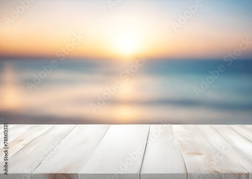 Wood table top on blur sparkling sea water and summer sky background morning