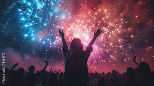 Exhilarating Fireworks Display at a Nighttime Festival with Joyful Crowd Celebrating
