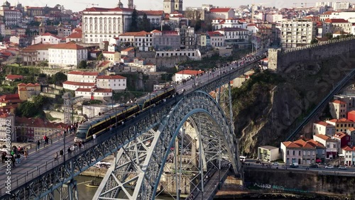 Porto, Portugal stunning timelapse view of the Bridge Ponte Dom Luis with lots of tourists passing by