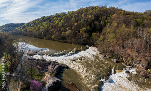 Aerial view of Valley Falls State Park near Fairmont in West Virginia on a spring day with redbud blossoms on the trees photo