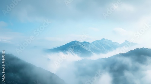 Mountain peaks through the fog