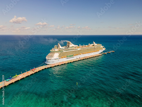 Aerial view of beautiful blue ocean coast, Coco Cay, Freedom of the Seas, cruise ship, The Bahamas. photo