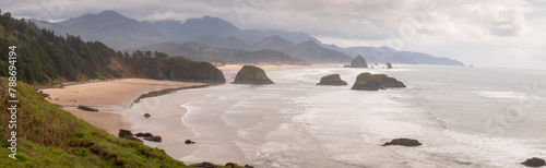 View of Haystack Rock from Ecola State Park. Known for some of the best views on the Oregon Coast and Haystack Rock, Ecola State Park is an ideal spot to watch enormous storm waves roll in. photo