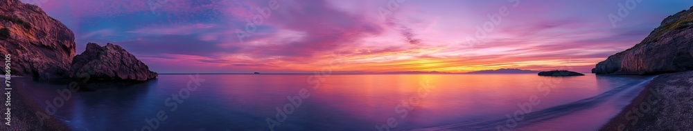 Obraz premium Purple Sunset Over Tranquil Ocean Bay