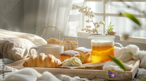 tray overflows with an array of delectable pastries alongside a steaming cup of tea, creating a harmonious scene of indulgence and comfort, Mother`s Day concept, breakfast in bed