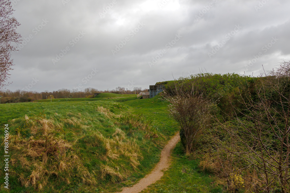 Fortifications and bunkers from the Napoleonic era in the Dutch fort known as Dirks Admiraal in Den Helder on a cloudy, rainy spring day