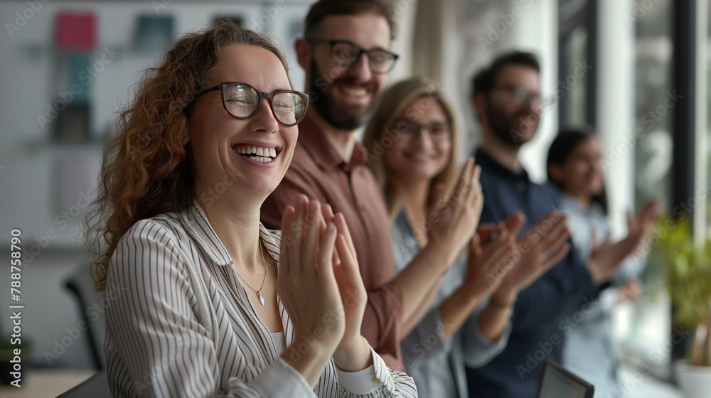An executive team in a modern office, applauding and smiling as they conclude a successful presentation, their expressions a mix of pride and satisfaction. An executive team in a modern office, applauding and smiling as they conclude a successful presentation, their expressions a mix of pride and satisfaction.