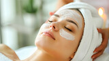 woman with facial mask at treatment in a spa