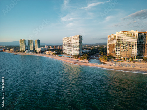 Aerial view at sunset of Peninsula Puerto Vallarta in the Hotel Zone near Playa de Oro in Jalisco Mexico.
