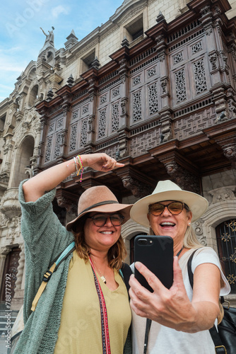 tourists take a selfie in lima. Copy space.