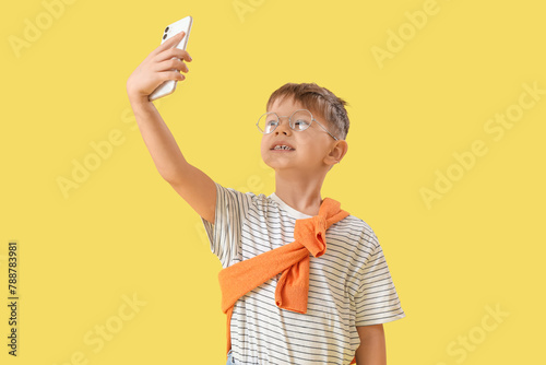 Cute little boy in eyeglass...