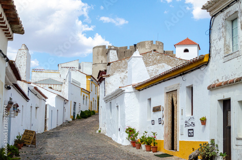 street with houses of traditional architecture in the medieval town of Evoramonte, Alentejo region. Portugal
