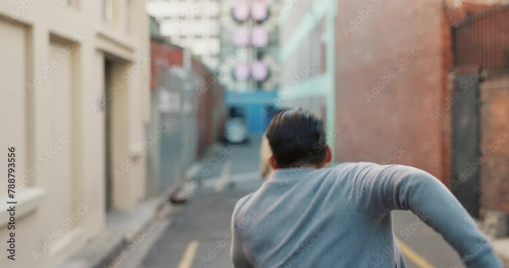 Man, thief and running with phone in city street, road or alley for robbery, crime or stolen property. Rear view of male person getting robbed with smartphone in hallway or passage in an urban town Man, thief and running with phone in city street, road or alley for robbery, crime or stolen property. Rear view of male person getting robbed with smartphone in hallway or passage in an urban town