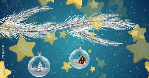 Snowflakes are falling gently around festive decorations hanging from branch