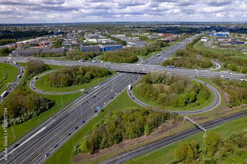 Greenery islands aerial of transit roundabout Hoevelaken intersection circle in Dutch landscape. Urban transportation infrastructure 