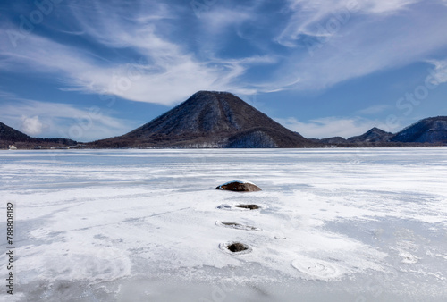 Small Mount Fuji with frozen lake