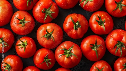 Vibrant close-up of fresh red tomatoes with green stems on black background, suggesting themes of healthy eating and summer harvests. © BrightWhite