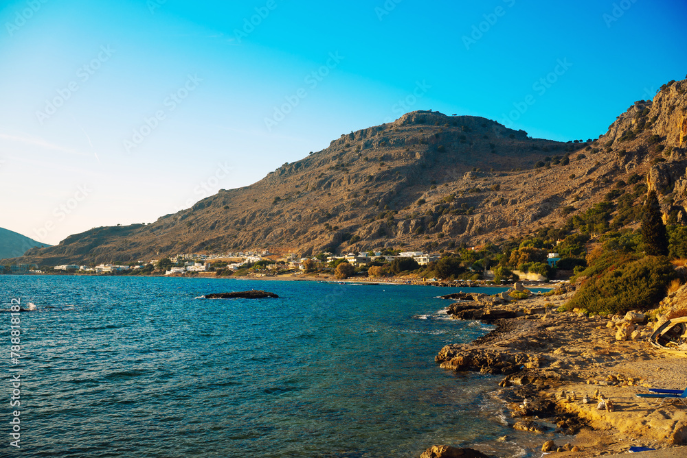 Fototapeta premium Pefki beach with houses on the island of Rhodes.
