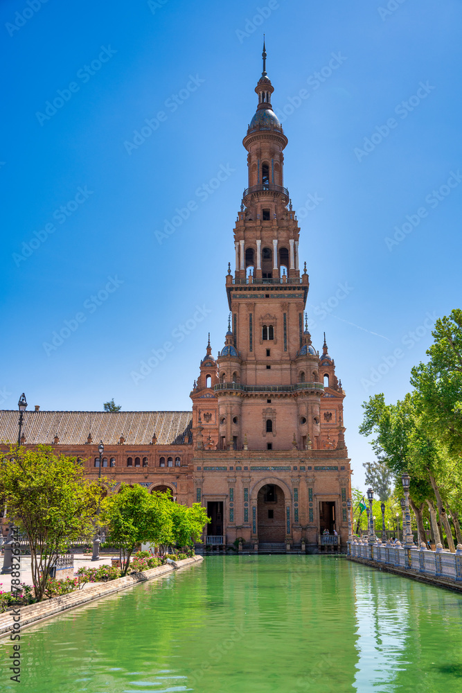 Sevilla, Spain - April 10, 2023: Lake of Plaza de Espana with buildings in the background
