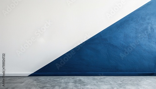 Empty room with electric blue and white walls  concrete flooring