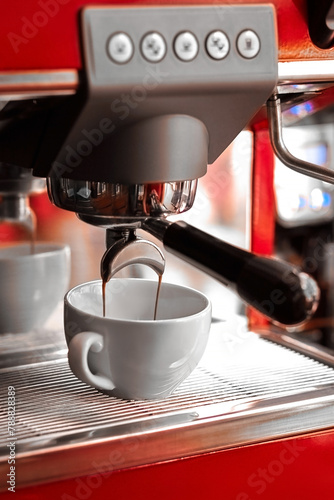 Preparing dopio on a professional coffee machine photo