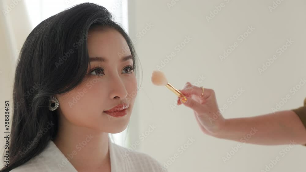 Graceful Makeup Application on Young Asian Woman Graceful Makeup Application on Young Asian Woman