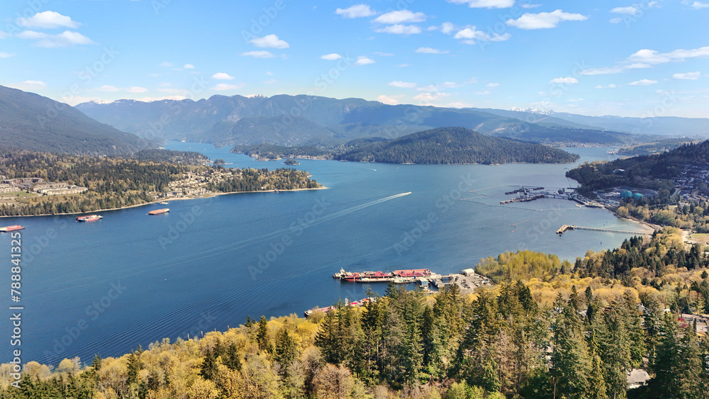 Beautiful aerial view of the Burrard Inlet as seen from North Burnaby during a spring season in British Columbia, Canada