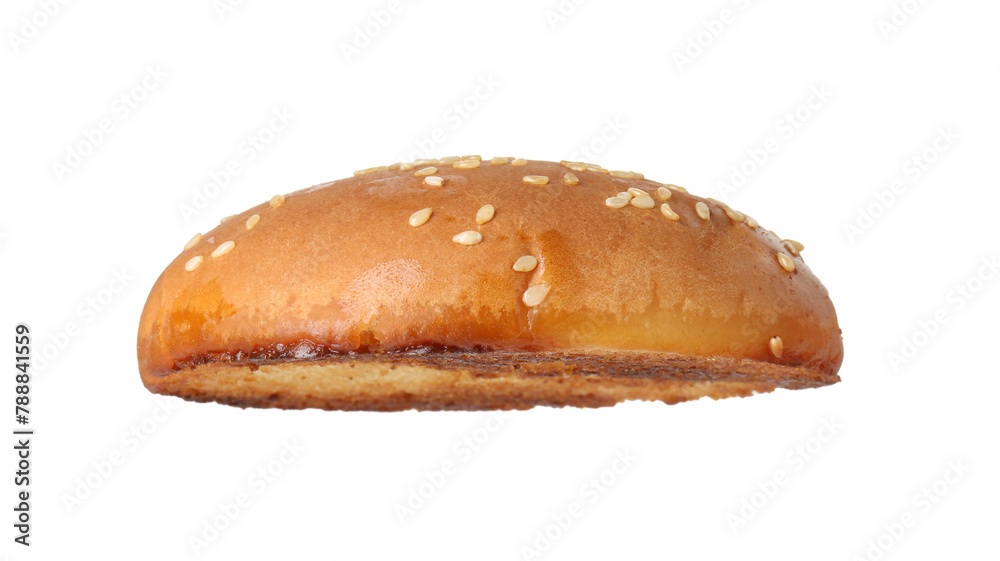 Half of grilled burger bun isolated on white Half of grilled burger bun isolated on white