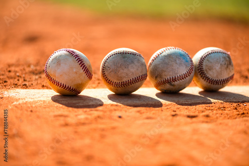 Four worn baseballs on Pitcher's Mound © Eric Hood