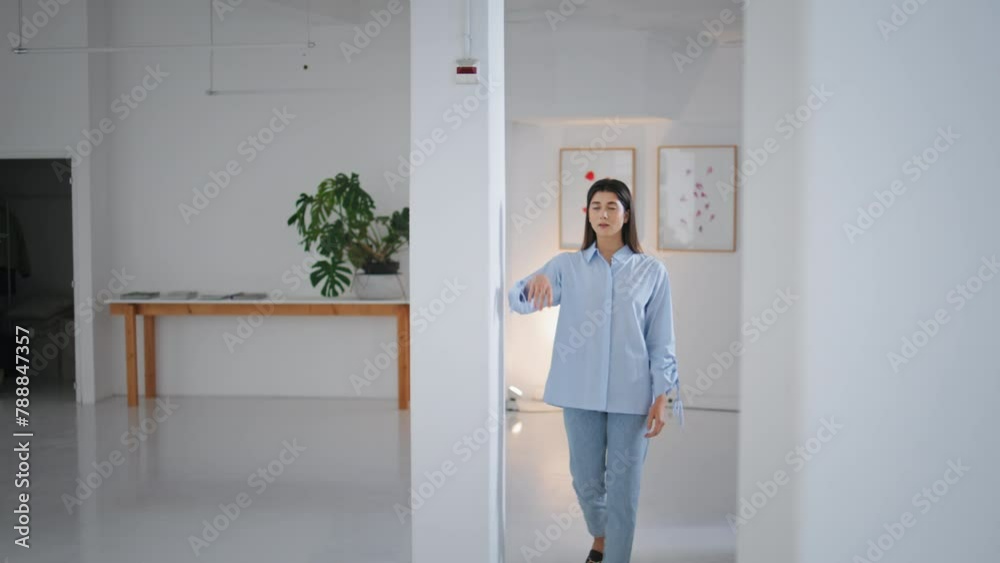 Successful businesswoman posing office. Confident brunette woman lean white wall Successful businesswoman posing office. Confident brunette woman lean white wall