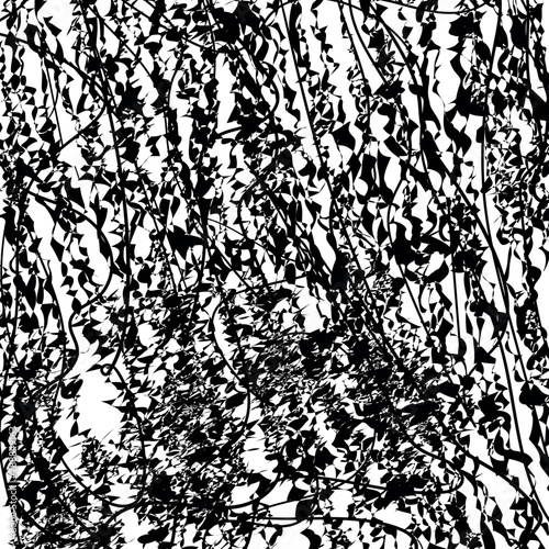 Abstract image with a noisy mass or accumulation of vegetation in the form of branches and leaves.