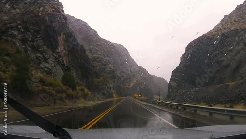 Driving through tunnel in Wind River Canyon near Thermopolis Wyoming on a rainy day with sounds of windshield wipers photo