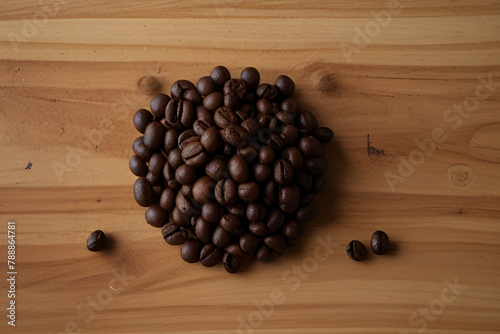 Coffee beans spreaded on wooden base