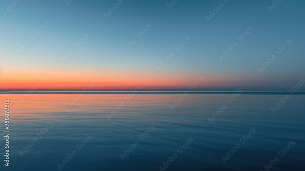 Gentle dawn over tranquil sea with minimalist clouds for serene panoramic background