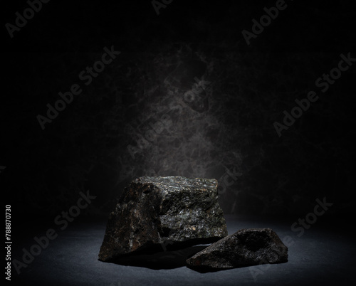 natural stones on a dark background for the podium