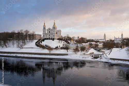 Assumption Mountain, the Holy Spirit Monastery and the Holy Assumption Cathedral on the banks of the Western Dvina and Vitba rivers on a sunny winter evening, Vitebsk, Belarus
