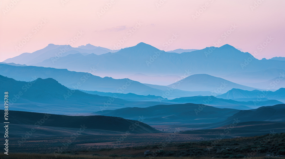 Serene twilight over gentle mountains for soothing landscape imagery
