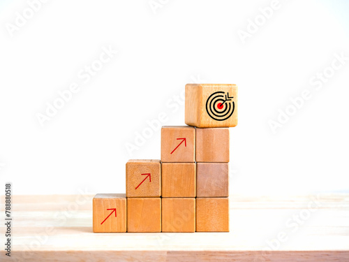 Arrow upward to the target icon symbol on wooden cube blocks, bar graph chart steps on white background, profit planning, marketing passive income, business growth process concepts, minimal style.