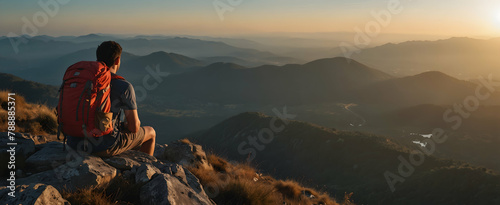 Summit Adventure: Backpacker's Joyful View of Vast Landscape - Natural Exposure Photo Stock