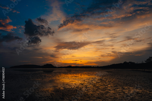 Calm beach and sky at dusk