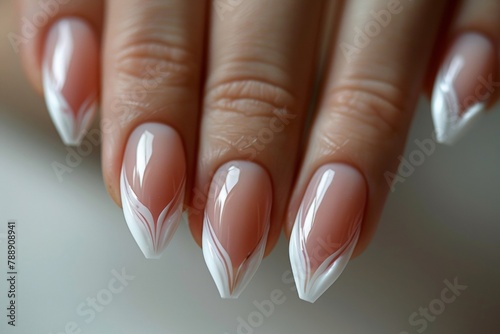Intricate French Tip Nail Design on Woman's Hands in Natural Light photo