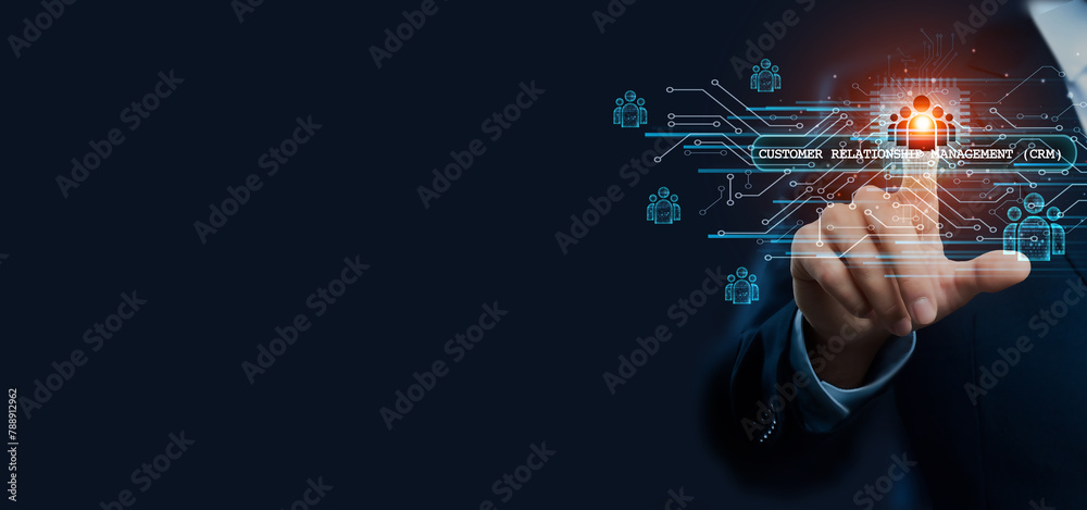 Businessman hand touching virtual graphical interface of Customer Relationship Management (CRM) innovation. Idea for enhanced customer solution. Businessman hand touching virtual graphical interface of Customer Relationship Management (CRM) innovation. Idea for enhanced customer solution.