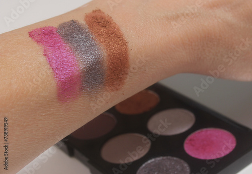 Testing Colorful Cosmetics on Arm Close up