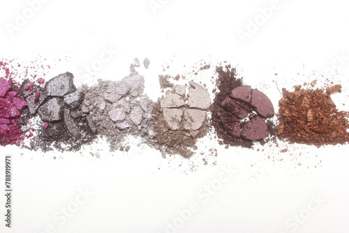 Broken Cosmetic Pigments on light colored background