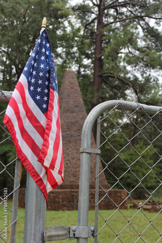 Killough Monument and Cemetery During Rain With American Flag