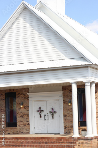 Double Doors With Cross Decorations at Rural Texas Church © LMPark Photos