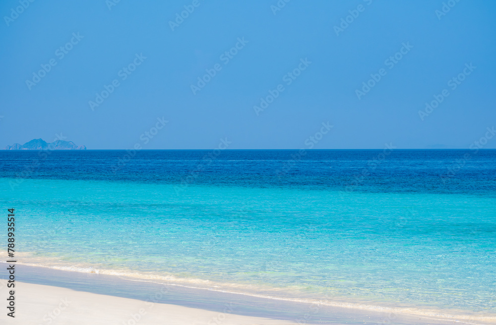 Ocean sea background and the clear sky For summer vacation ideas Nature of summer sea water with sunlight The sea sparkles against the blue sky	
