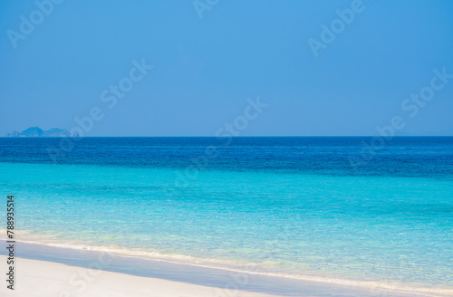 Ocean sea background and the clear sky For summer vacation ideas Nature of summer sea water with sunlight The sea sparkles against the blue sky 